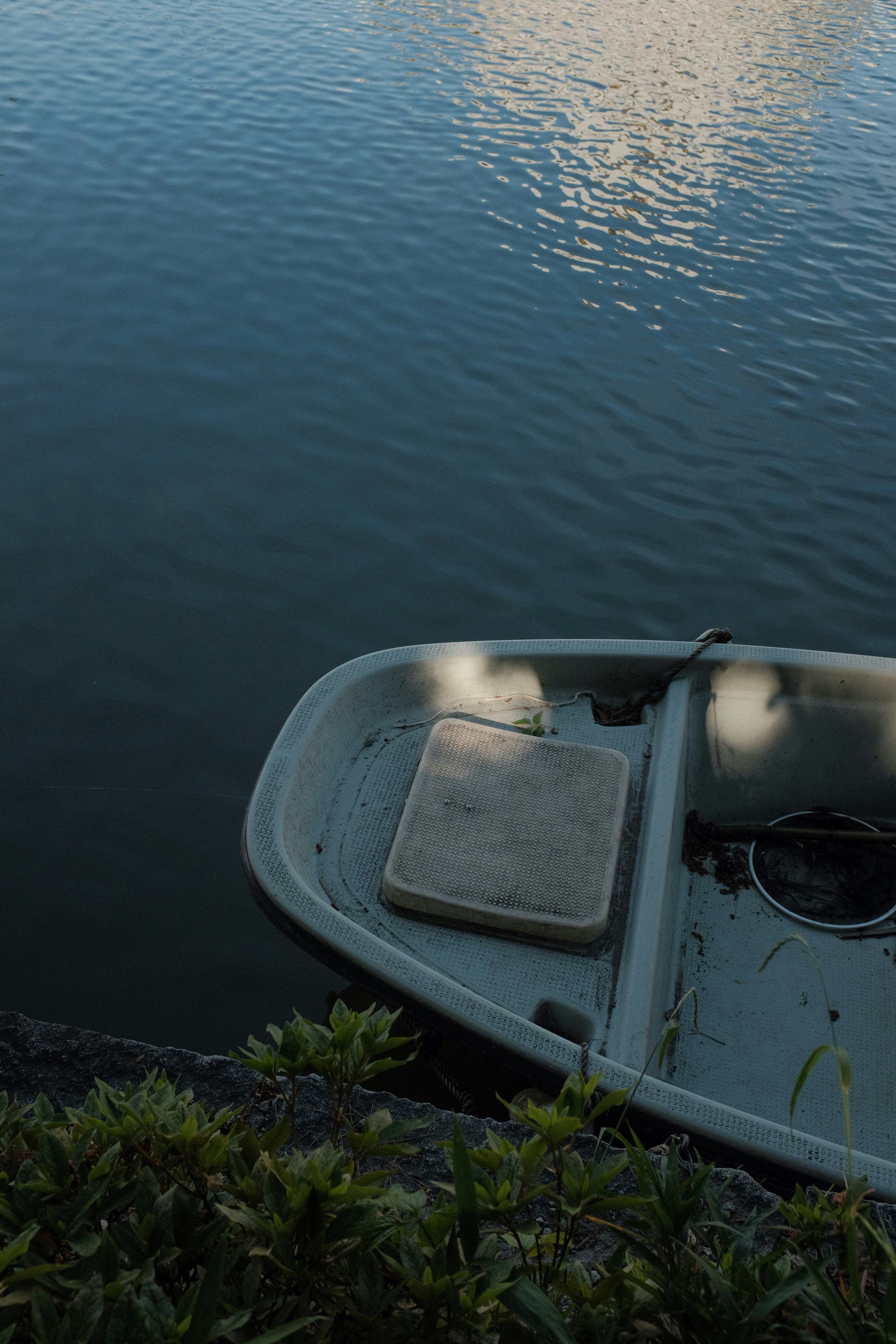 white boat on water during daytime